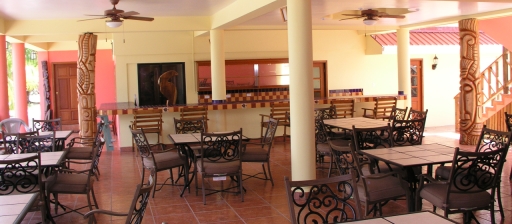 Restaurant and Bar area of Paradise Vacation Hotel, in Placencia, Belize.