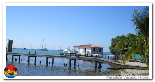Boats anchored in Placencia, Belize by Alan Stamm