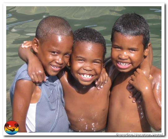 The boys were swimming by the dock by Andrea and Kenny